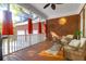 Relaxing screened porch with wicker furniture and a ceiling fan at 3400 Henrietta Hartford Rd, Mount Pleasant, SC 29466