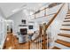 Elegant staircase leading to an upper level, overlooking living room at 3400 Henrietta Hartford Rd, Mount Pleasant, SC 29466