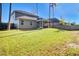 Large backyard with grassy area and view of home's exterior at 700 Kilarney Rd, Summerville, SC 29483