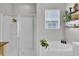 Clean bathroom with a shower/tub combo and a window for natural light at 700 Kilarney Rd, Summerville, SC 29483