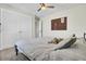 Serene bedroom with a king-size bed, built-in shelving and award display at 700 Kilarney Rd, Summerville, SC 29483