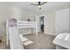 Well-lit bedroom with a loft bed and slide, ideal for children at 700 Kilarney Rd, Summerville, SC 29483