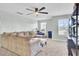 Spacious bonus room with sectional sofa and entertainment center at 700 Kilarney Rd, Summerville, SC 29483