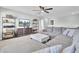 Bright bonus room featuring a sectional sofa and large TV at 700 Kilarney Rd, Summerville, SC 29483