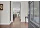 Bright entryway with hardwood floors, leading to the main living area at 700 Kilarney Rd, Summerville, SC 29483