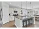 Spacious kitchen with an island, granite countertops and stainless steel appliances at 700 Kilarney Rd, Summerville, SC 29483