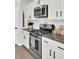 Stainless steel appliances and dark granite countertops in this kitchen at 700 Kilarney Rd, Summerville, SC 29483