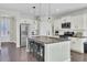 Modern kitchen featuring white cabinets, granite countertops, and stainless steel appliances at 700 Kilarney Rd, Summerville, SC 29483