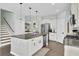 Modern kitchen with white cabinets, granite countertops and stainless steel appliances at 700 Kilarney Rd, Summerville, SC 29483
