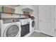 Convenient laundry room with washer, dryer, and extra storage at 700 Kilarney Rd, Summerville, SC 29483