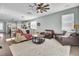 Relaxing living room featuring comfortable seating and large TV at 700 Kilarney Rd, Summerville, SC 29483