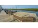 Large wooden community dock with benches at 7201 Bowen Corner Ave, Hanahan, SC 29410