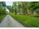 Gravel path through lush green landscape at 7201 Bowen Corner Ave, Hanahan, SC 29410