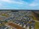 Expansive aerial view of a new residential development showcasing various house styles at 104 True Blue, Summerville, SC 29486