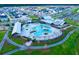 Aerial view of community pool, clubhouse, and surrounding homes at 104 True Blue, Summerville, SC 29486