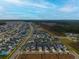 Wide aerial view of a large residential community with tree-lined streets at 104 True Blue, Summerville, SC 29486