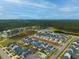 Aerial view of a residential neighborhood with houses, streets, and green spaces at 104 True Blue, Summerville, SC 29486