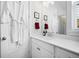 White bathroom vanity with a single sink and plenty of storage at 104 True Blue, Summerville, SC 29486