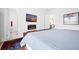 Bright bedroom with a comfortable bed, fireplace, and views into the kitchen at 104 True Blue, Summerville, SC 29486