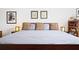 Primary bedroom with a king-size bed, nightstands, and decorative pillows at 104 True Blue, Summerville, SC 29486