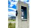 Modern community entrance with brick pillars and stylish light fixture at 104 True Blue, Summerville, SC 29486