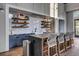 Modern community kitchen with a large island and stylish cabinetry at 104 True Blue, Summerville, SC 29486