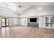 Large community room with hardwood floors and high ceilings at 104 True Blue, Summerville, SC 29486