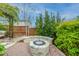 Stone fire pit on a brick patio at 104 True Blue, Summerville, SC 29486