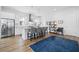 Modern kitchen with white cabinets, stainless steel appliances and an island with seating at 104 True Blue, Summerville, SC 29486