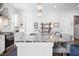 Modern kitchen island with granite countertop and seating at 104 True Blue, Summerville, SC 29486