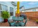 Metal table and chairs on a brick patio at 104 True Blue, Summerville, SC 29486