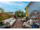 Brick patio with seating area and fire pit at 104 True Blue, Summerville, SC 29486