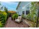 Brick patio with seating area and lush greenery at 104 True Blue, Summerville, SC 29486