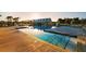 Community pool with lounge chairs and sunset view at 104 True Blue, Summerville, SC 29486