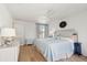 Bright bedroom with a king-size bed, hardwood floors, and ample natural light at 1505 Marsh Haven, Johns Island, SC 29455