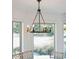 Five-light circular chandelier above a dining table at 1505 Marsh Haven, Johns Island, SC 29455