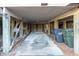 Under house concrete parking area with storage and trash cans at 1505 Marsh Haven, Johns Island, SC 29455
