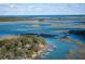 Waterfront property with private docks and lush trees at 1530 Oak Island Dr, Charleston, SC 29412