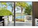 Deck overlooking tranquil water views with lush greenery at 1530 Oak Island Dr, Charleston, SC 29412