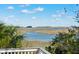 Serene view of the marsh from a deck, showcasing natural beauty at 1530 Oak Island Dr, Charleston, SC 29412