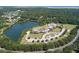 Aerial view of community with lake and clubhouse at 2860 Old Drake Dr, Johns Island, SC 29455