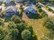 Aerial view of two-story home with large backyard at 3131 Palmetto Blvd, Edisto Island, SC 29438