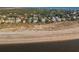 Aerial view of coastline with beachfront homes at 3131 Palmetto Blvd, Edisto Island, SC 29438