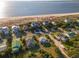 Aerial view of beachfront homes and community at 3131 Palmetto Blvd, Edisto Island, SC 29438