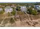 Aerial view of beach homes and boardwalk at 3131 Palmetto Blvd, Edisto Island, SC 29438