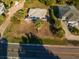 Aerial view of home with large deck and yard at 3131 Palmetto Blvd, Edisto Island, SC 29438