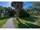 Paved bike path surrounded by lush greenery at 3131 Palmetto Blvd, Edisto Island, SC 29438