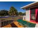 Deck with green lounge chair and view of neighborhood at 3131 Palmetto Blvd, Edisto Island, SC 29438