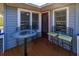 Small deck with a bistro table and chairs, perfect for relaxing at 3131 Palmetto Blvd, Edisto Island, SC 29438