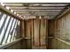 Rustic outdoor shower with wooden structure and shelves at 3131 Palmetto Blvd, Edisto Island, SC 29438